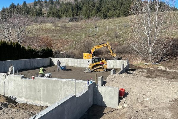 A concrete building foundation and site preparation on a Platinum Ridge Earthworks job site in the North Okanagan